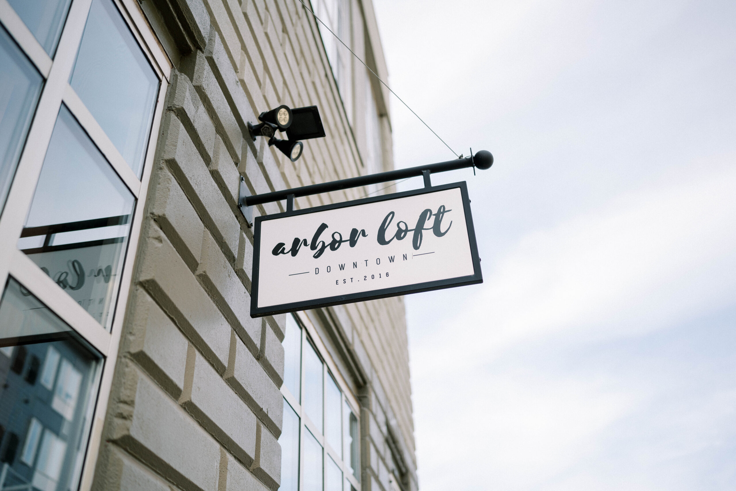 The arbor loft sign, in downtown Rochester