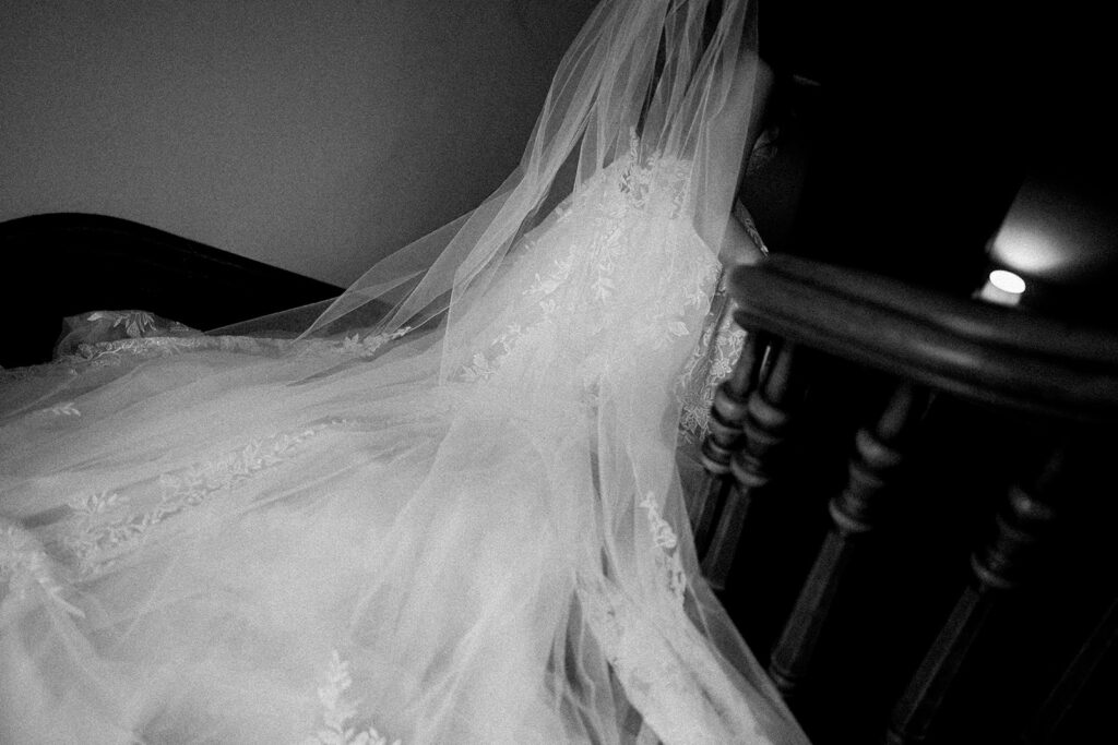 A bride walking down the stairs at The Deland House. 